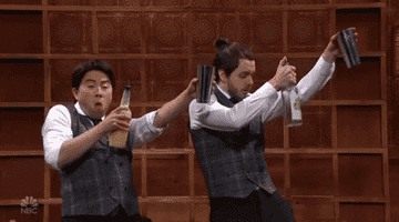 Gif of people dancing with drinks