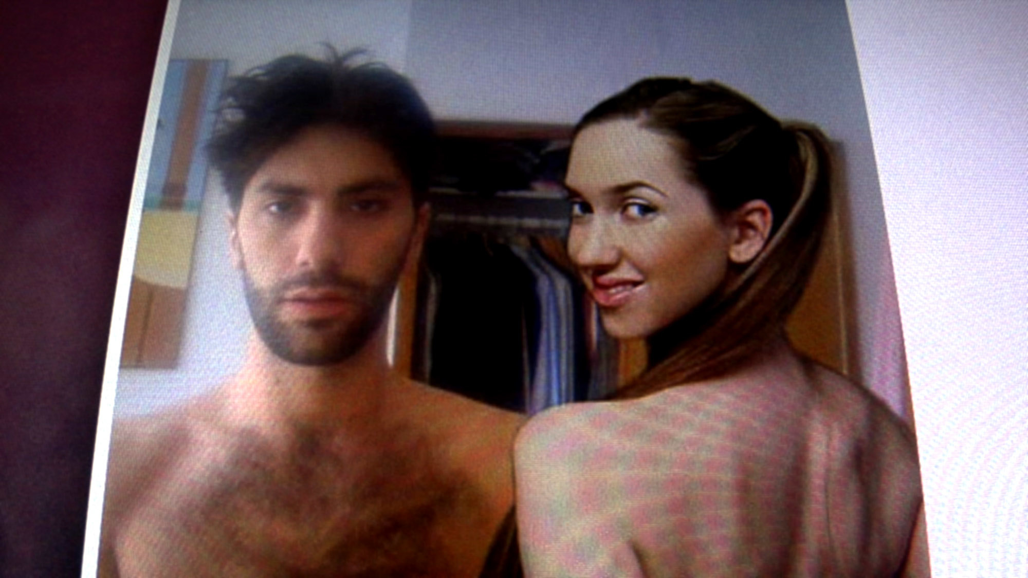 Nev Schulman and a woman posing in a photo in Catfish the movie