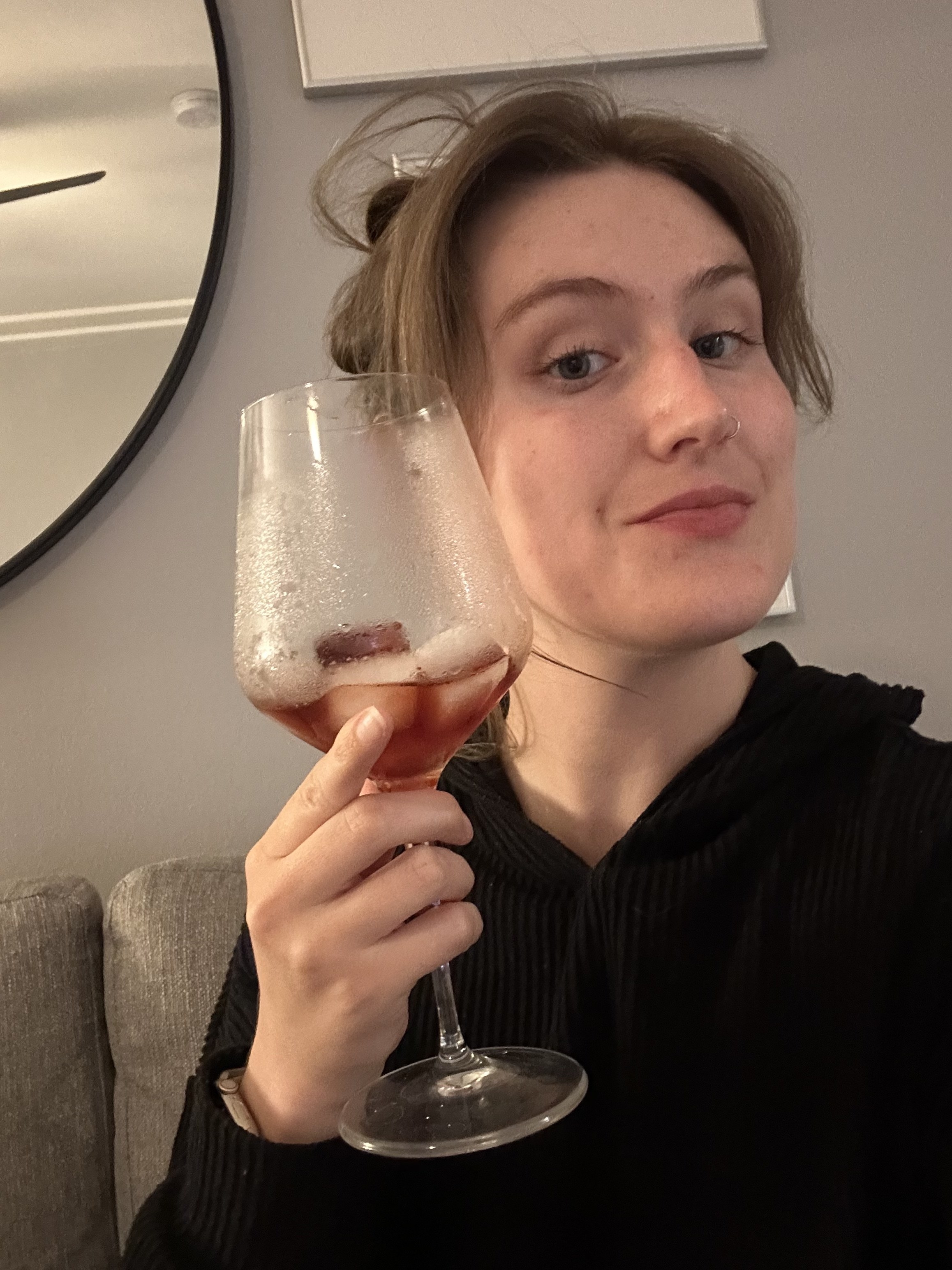 author with the almost empty drink