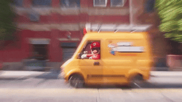 Mario and Luigi nodding from the interior of their plumbing company van in &quot;The Super Mario Bros. Movie&quot;