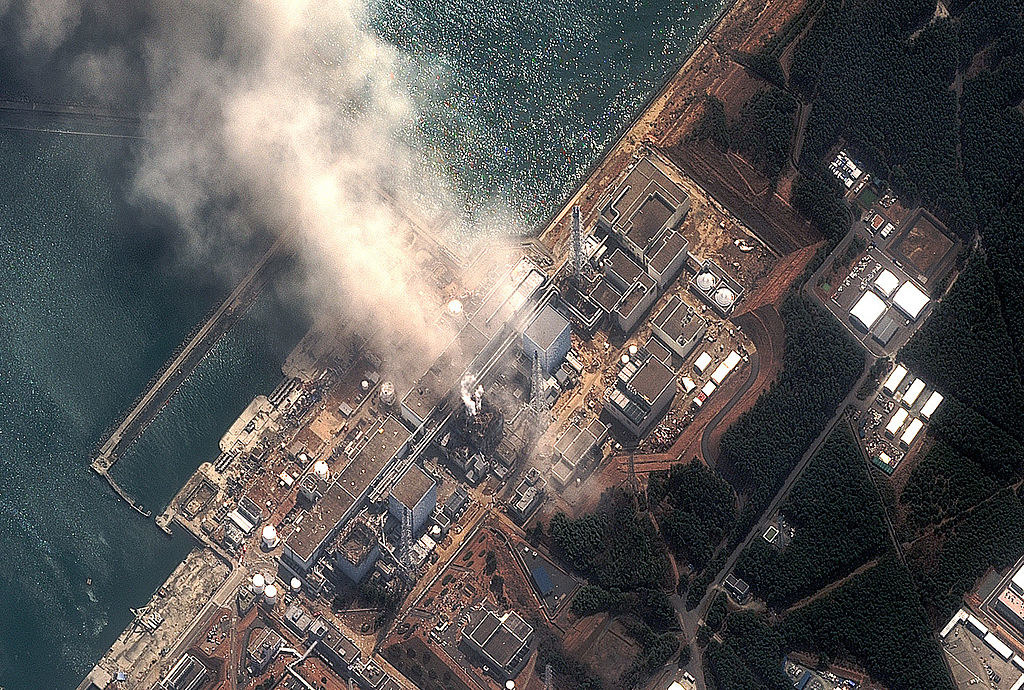 overhead view of the fukushima disaster, nuclear smoke going into the air