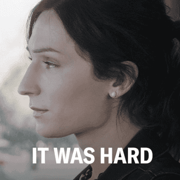 Woman turning to camera with text overlay that reads, &quot;It was hard&quot;