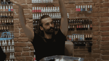 Jonathan Van Ness raising his arms saying, &quot;Yes yes&quot;