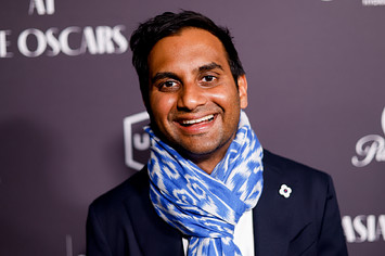 Aziz Ansari smiling in 2023