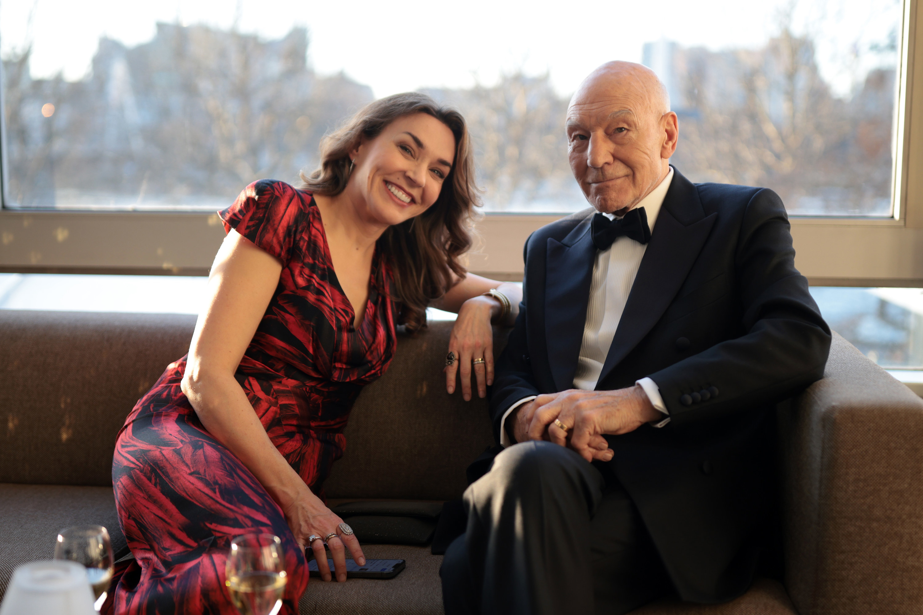 Sunny Ozell and Sir Patrick Stewart sitting together in 2023