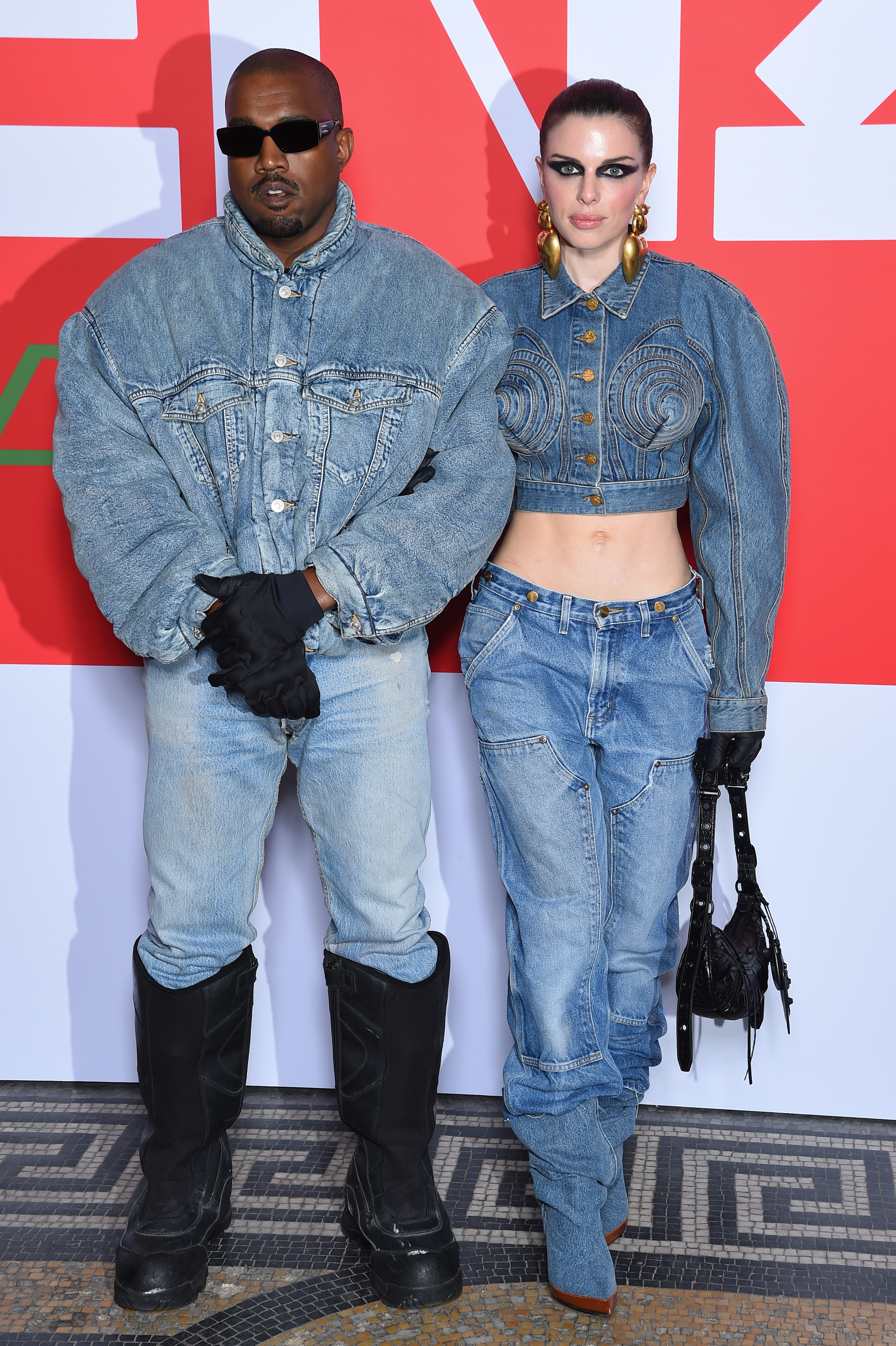 Kanye and Julia Fox posing together, they&#x27;re both wearing bonkers outfits that are denim from head to toe