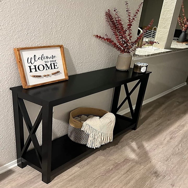 a reviewer photo of the black console table