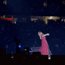 Taylor Swift nose diving into a pit on stage