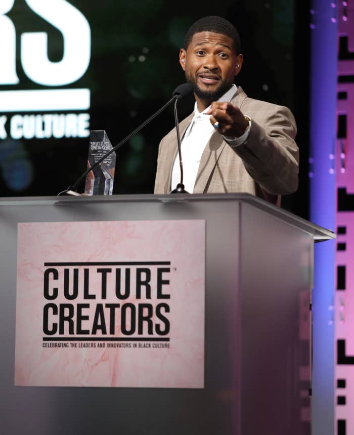 Usher at a podium
