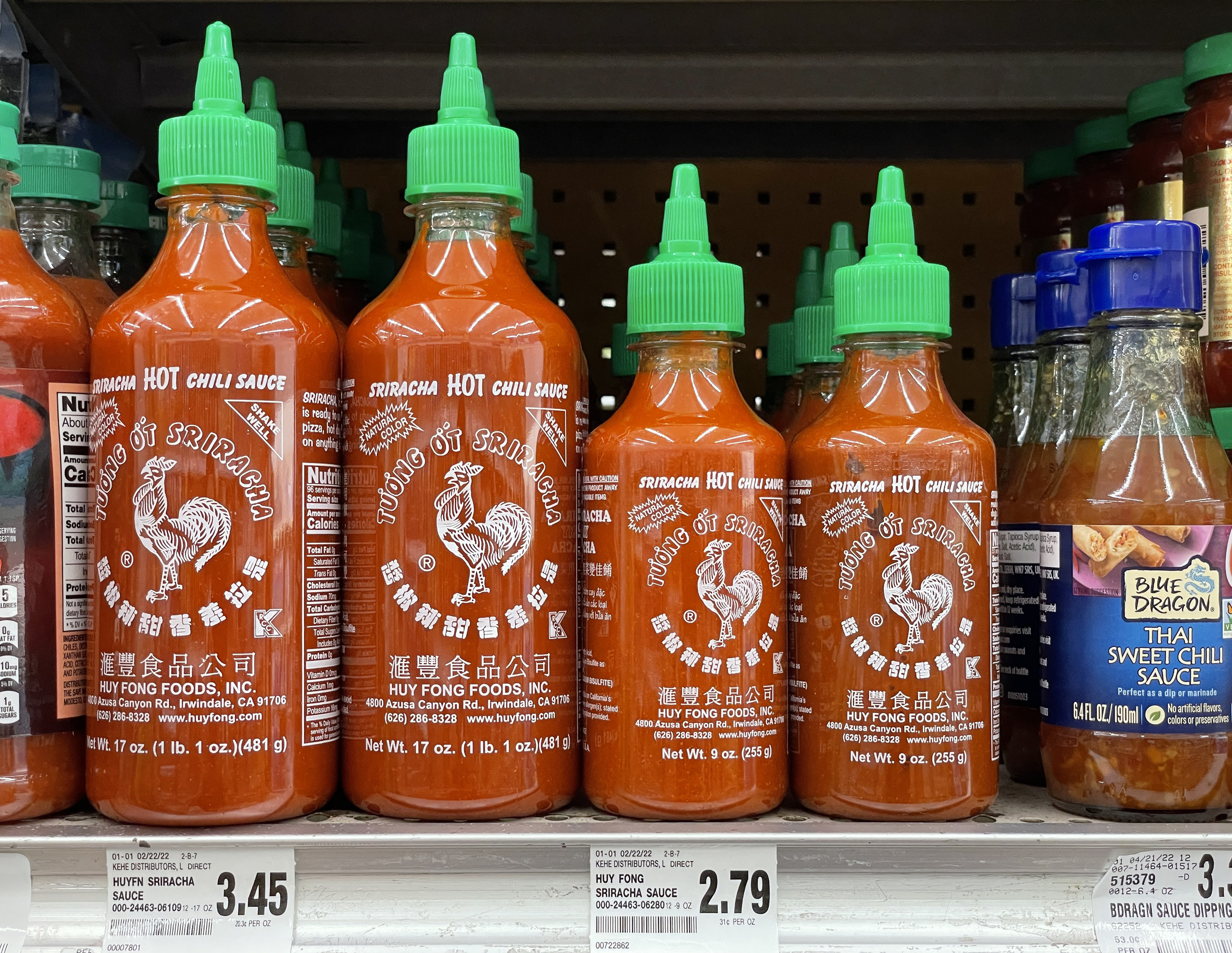 Sriracha sauce on a grocery store shelf