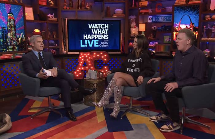 Andy Cohen, Scheana Shay, and Michael Rapaport on the stage of Watch What Happens Live