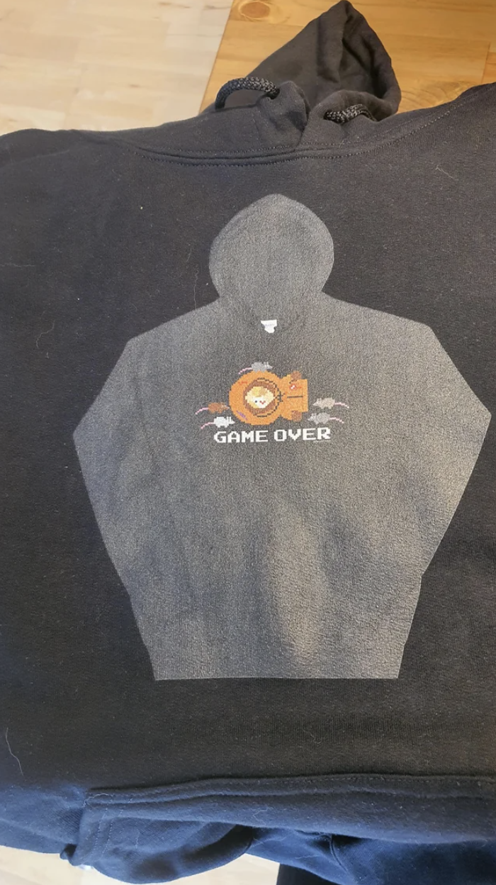 grey hoodie graphic with game over ironed on a black hoodie