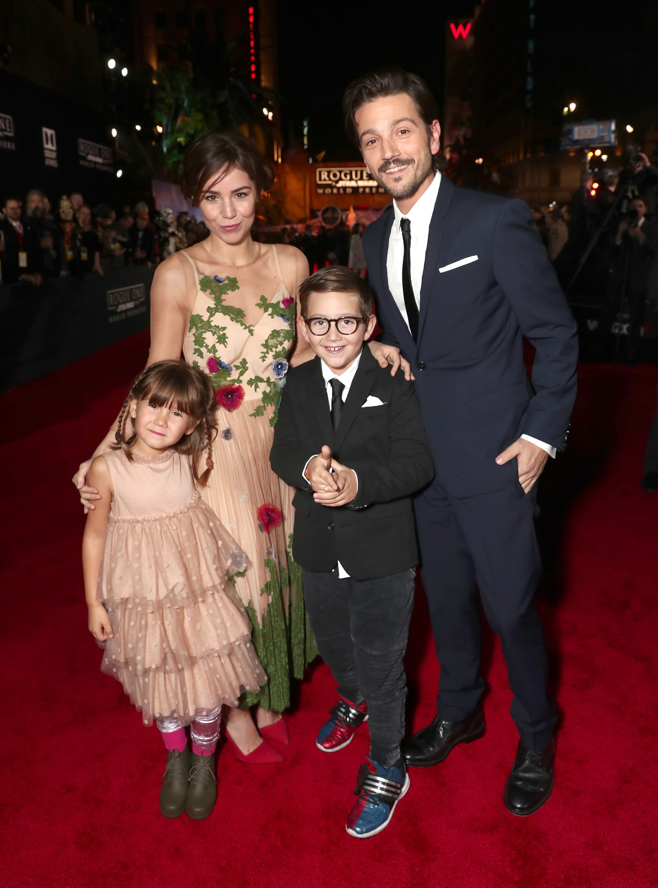 Diego Luna and Camila Sodi on a red carpet with their two kids
