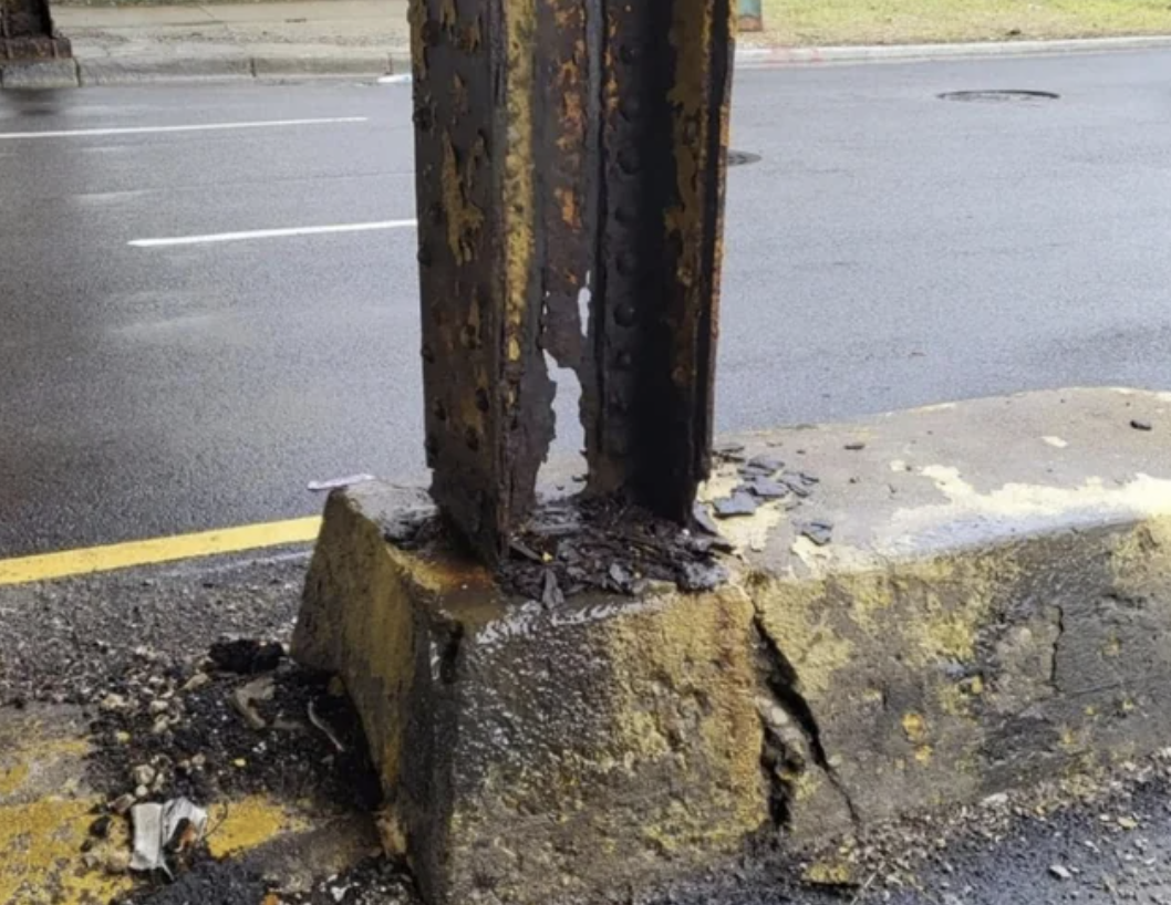 A crumbling bridge support beam