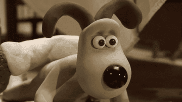 Claymation dog rolls his eyes, shakes his head, and plants hand on face.