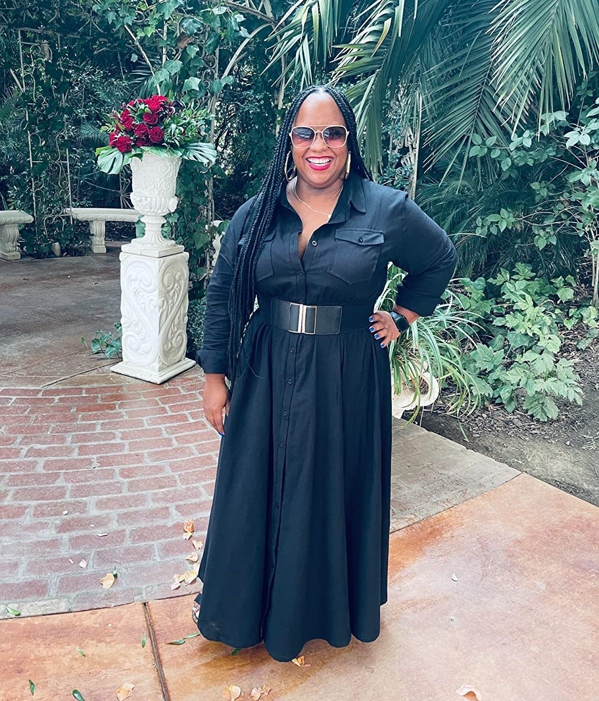 Reviewer in the black maxi dress