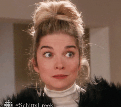 Alexis Rose makes a confused face