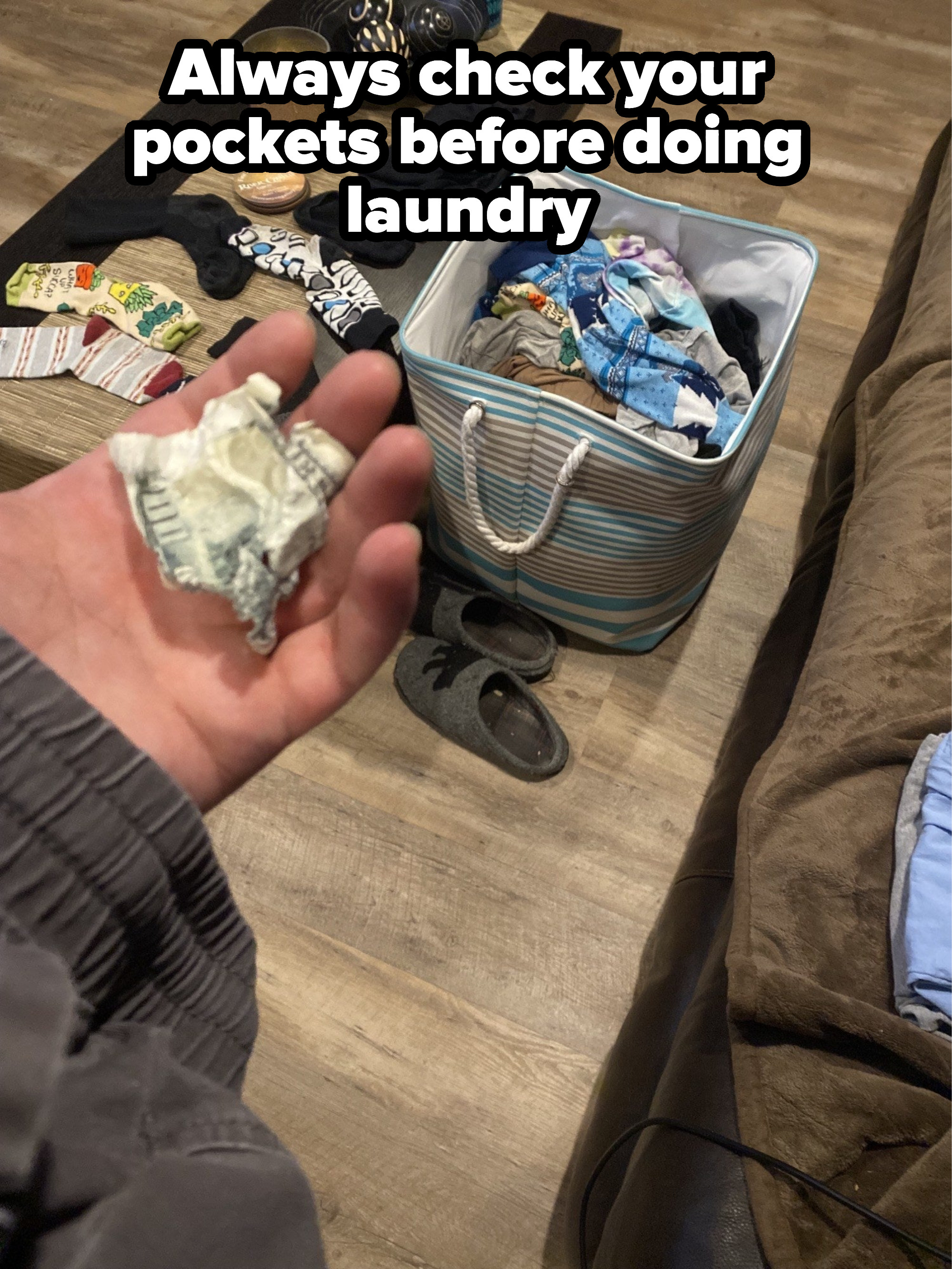 A person holds the remnants of a shredded $100 bill with the caption: &quot;Always check your pockets before doing laundry&quot;