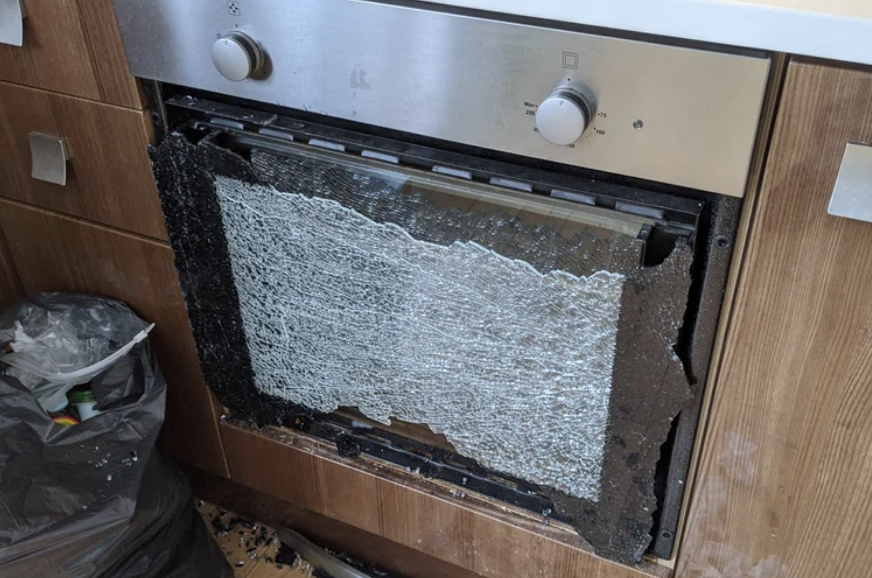 A shattered oven door