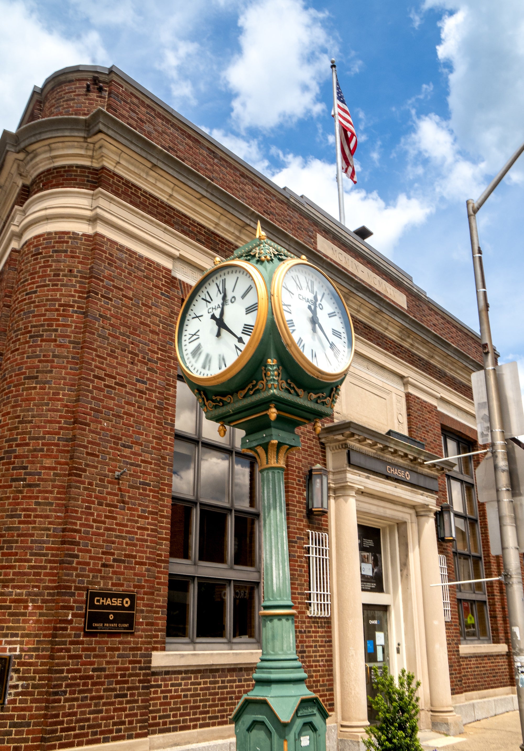A brick building and corner clock in Montclair, New Jersey