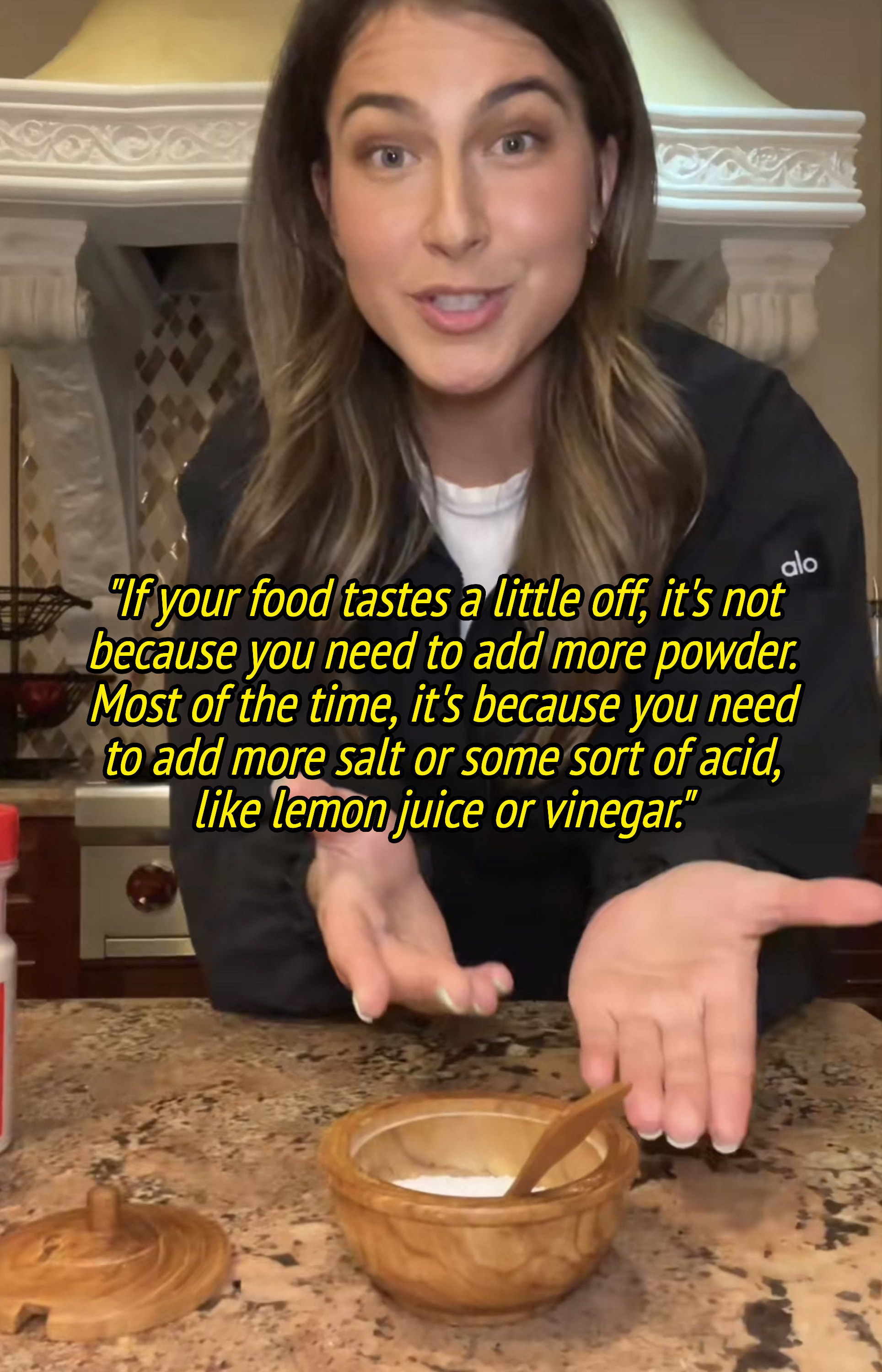 Zoe pointing to salt in video and saying &quot;if your food tastes a little off, it&#x27;s not because you need to add more powder; most of the time you need more salt or some sort of acid, like lemon juice or vinegar&quot;