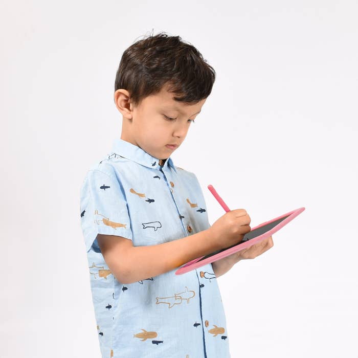Child using a drawing pad