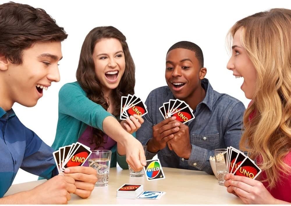 Group of teens playing Uno