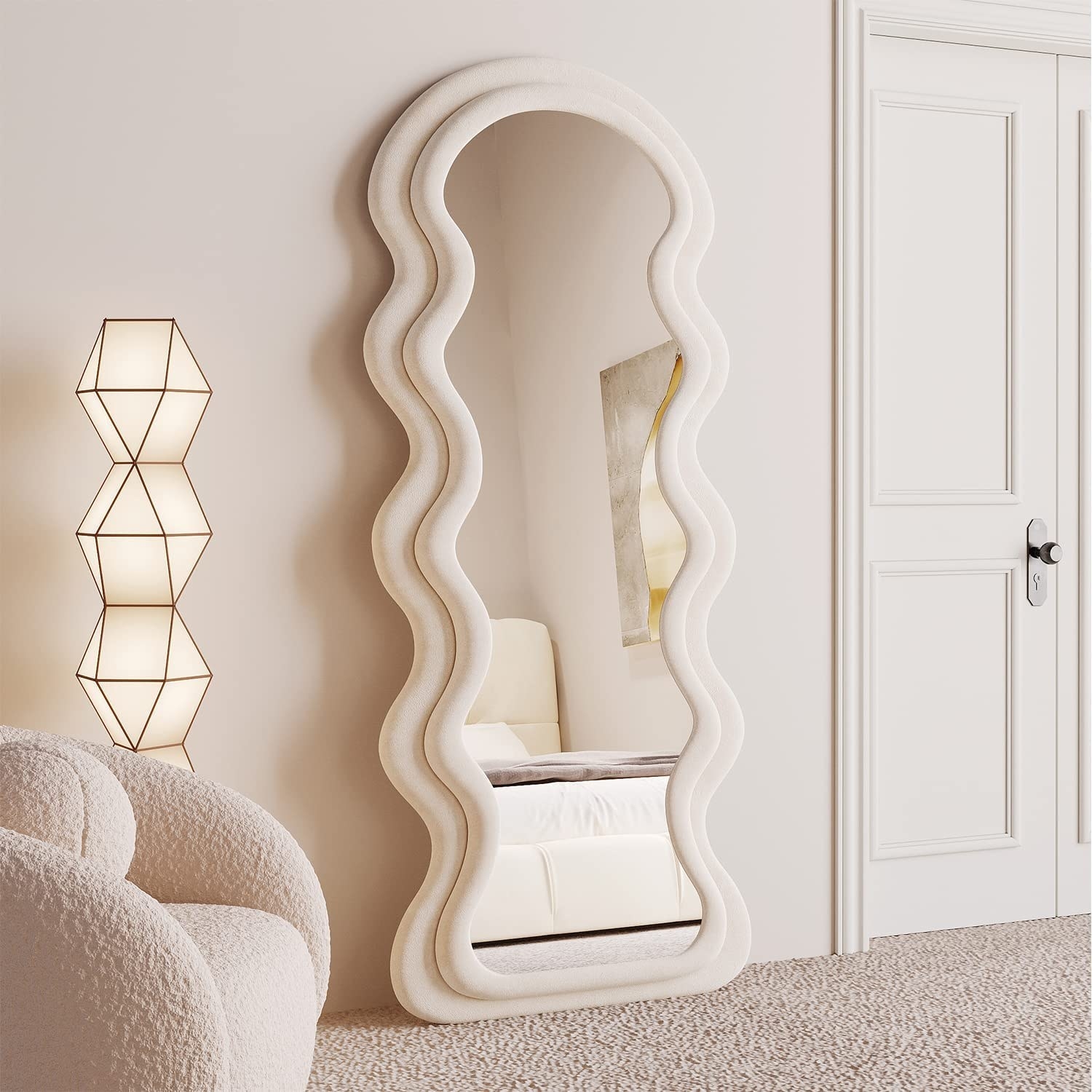 The wavy mirror is shown leaning against a wall