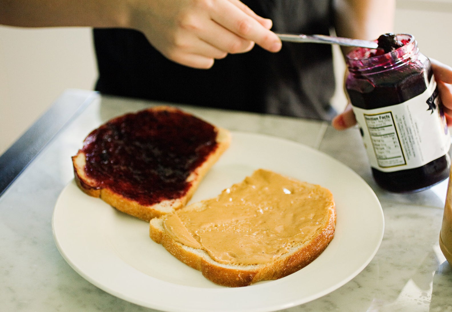 Making a peanut butter and jelly sandwich