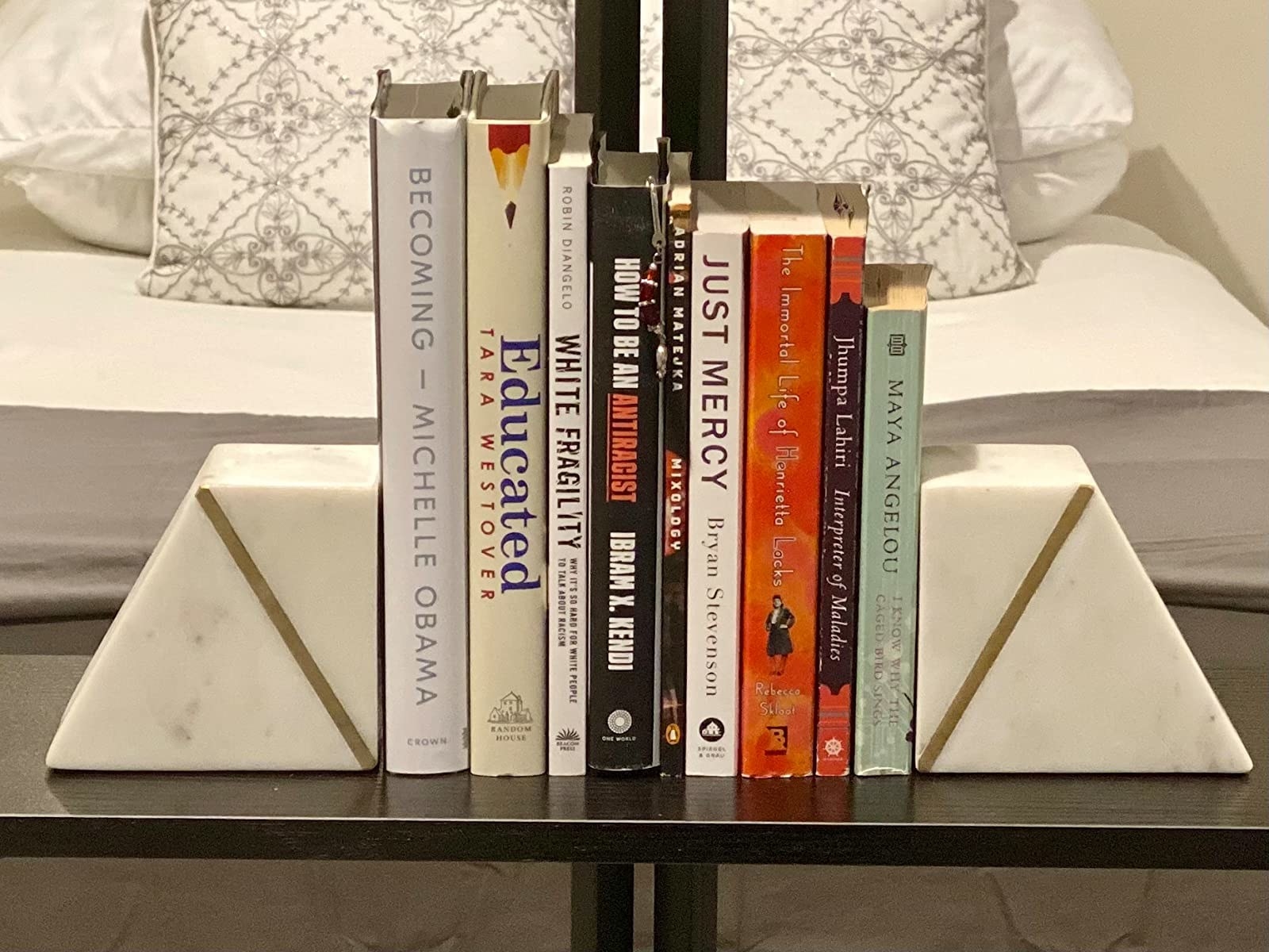 A reviewer&#x27;s photo of the bookends holding their books