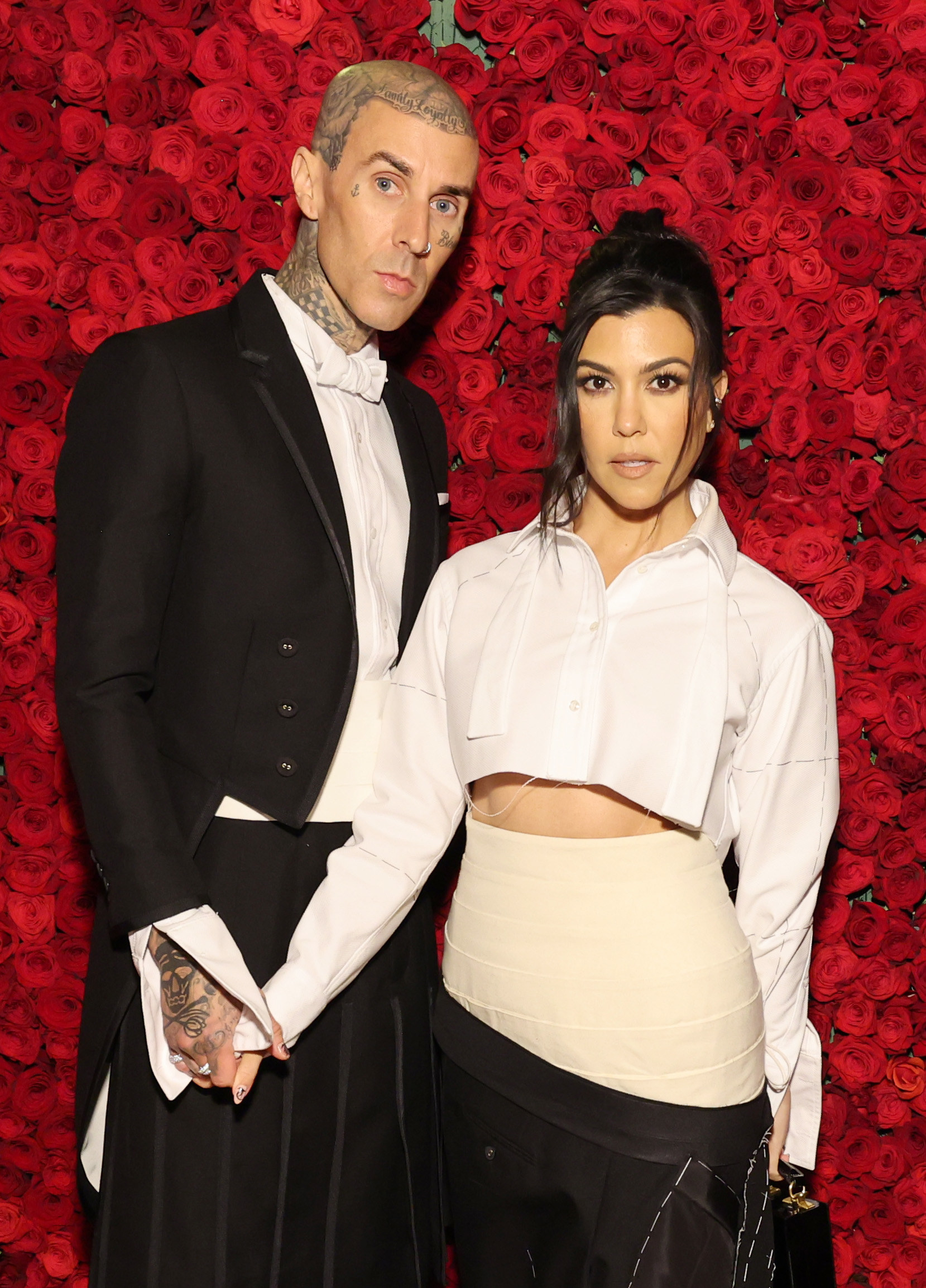 Closeup of Travis Barker and Kourtney Kardashian