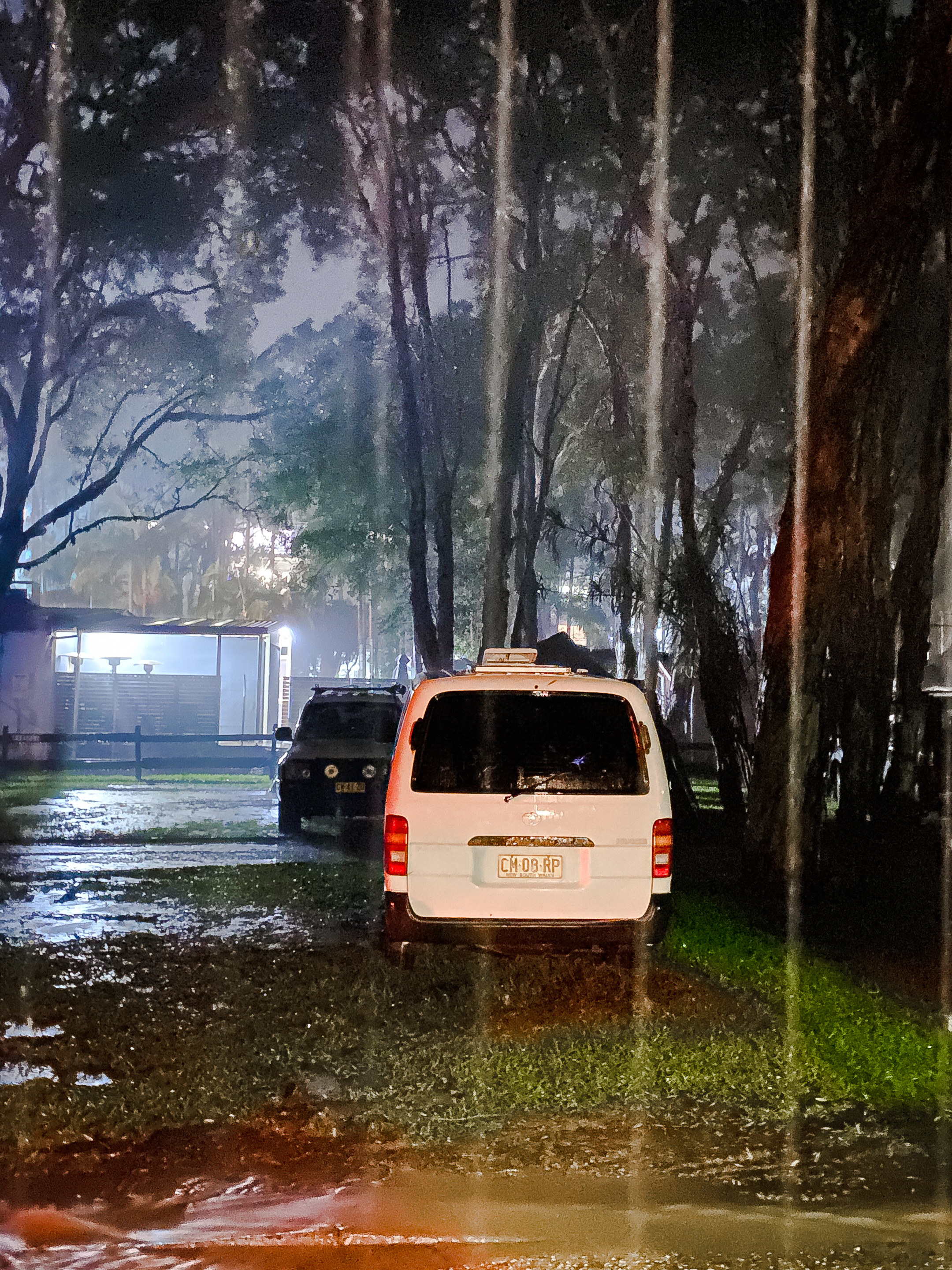 Photo of a van getting soaked in rain