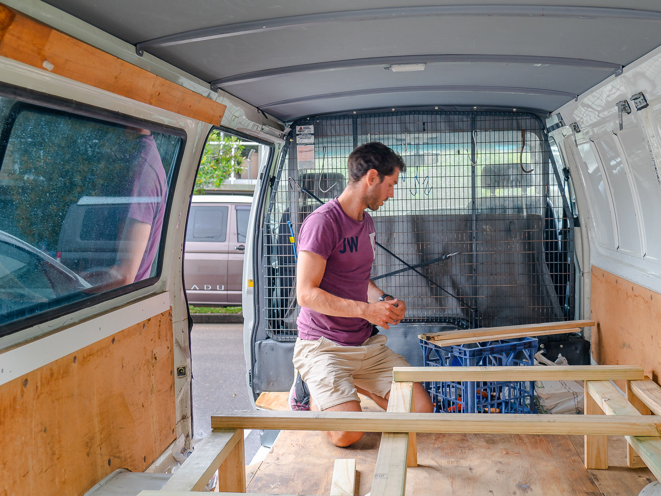 Photo of author&#x27;s friend doing their van conversion