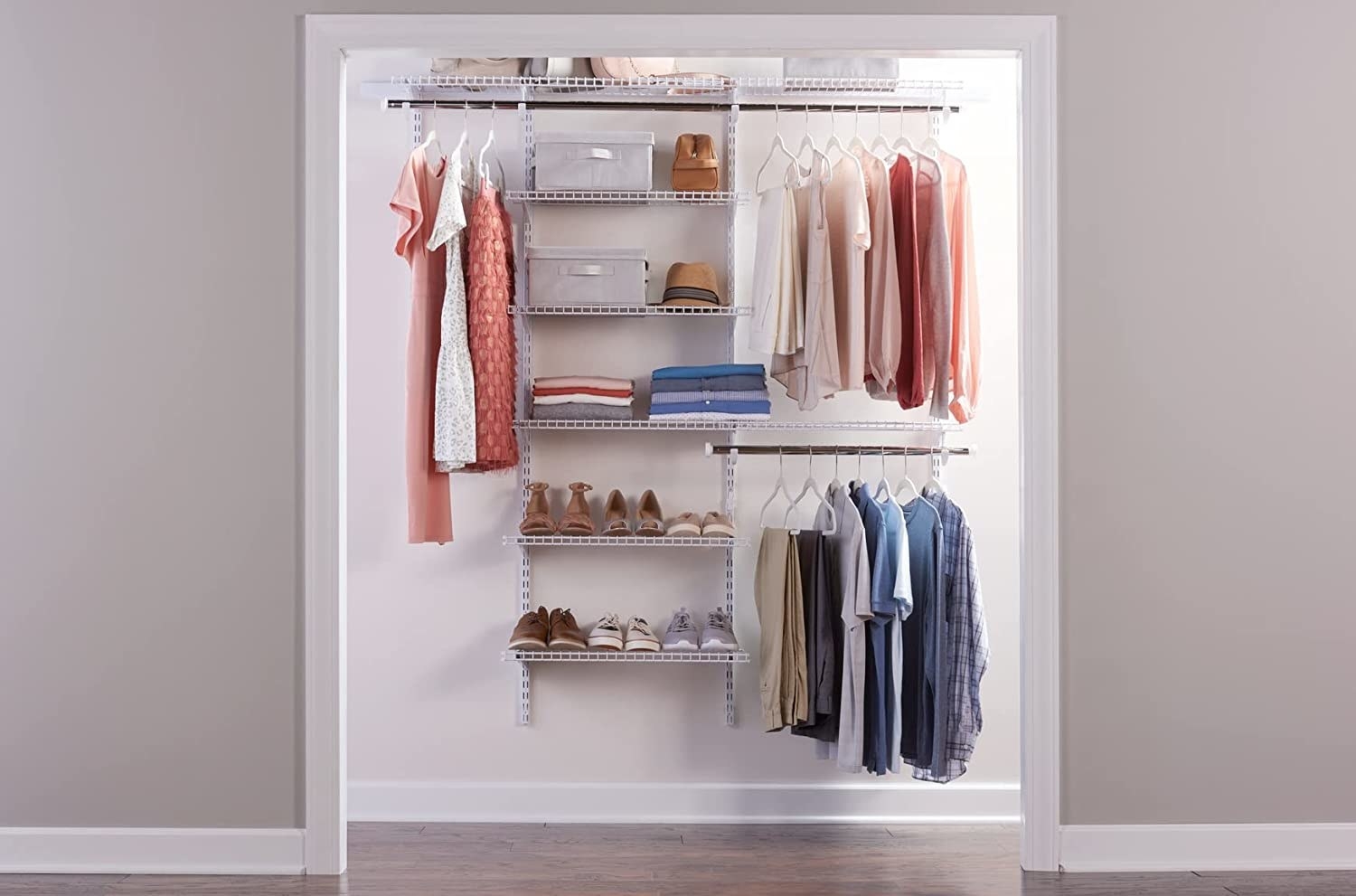The system in a closet with clothes hanging