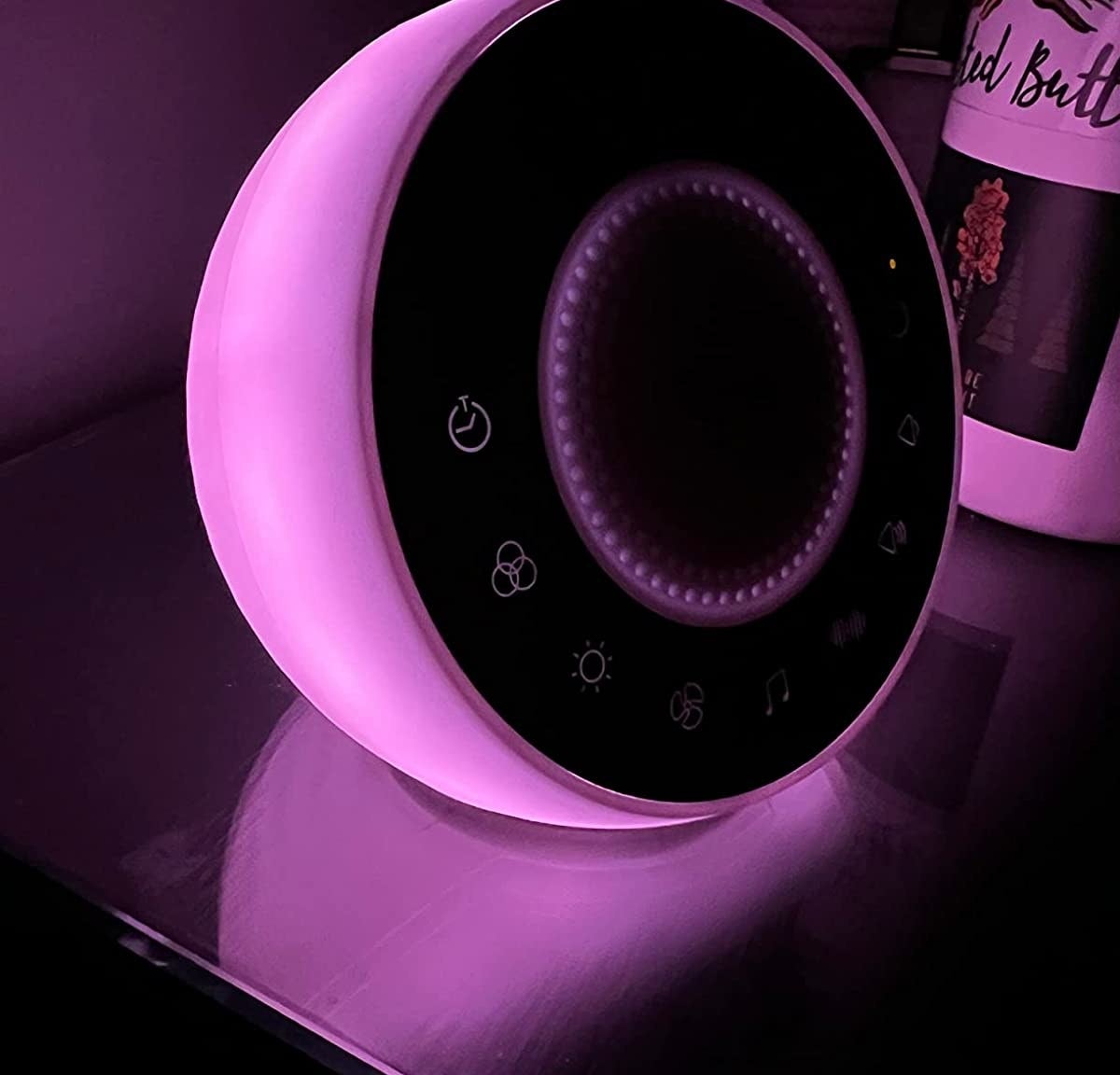 Reviewer photo of the machine with a purple light