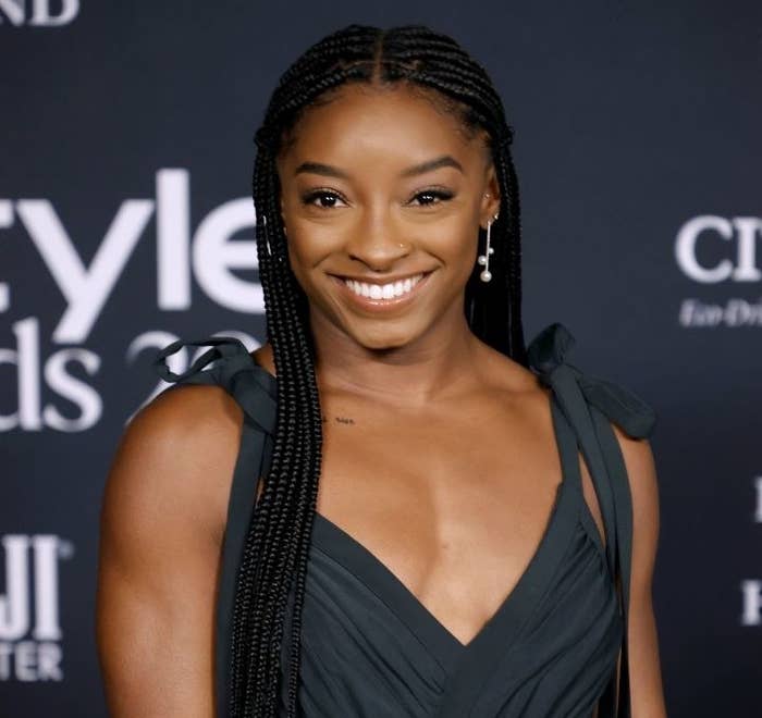 A close-up of Simone smiling