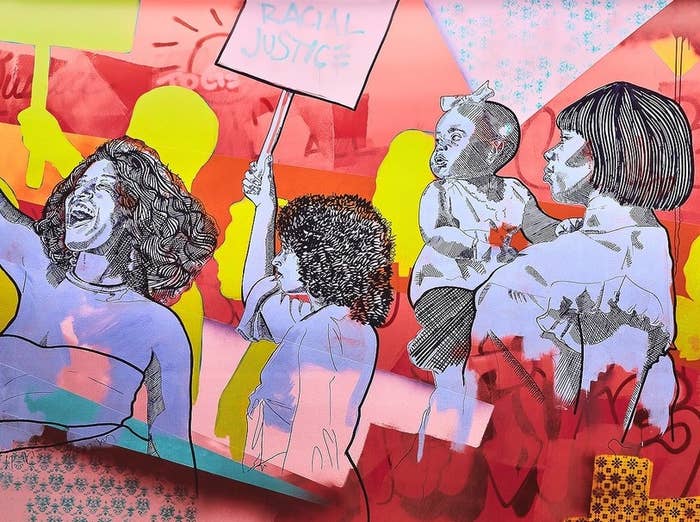 A colorful mural of people protesting