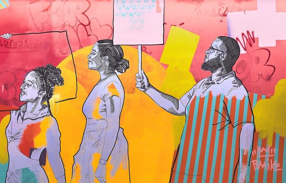 Another crop of the colorful mural with three people protesting