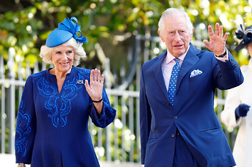 King Charles and Camilla waving