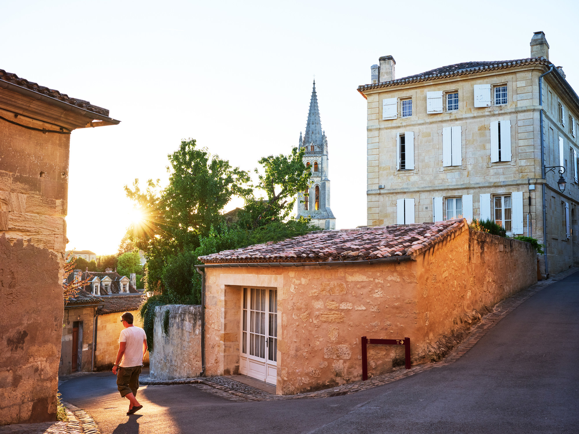 Tourist walking the streets of Saint-Emilion, Bordeaux.