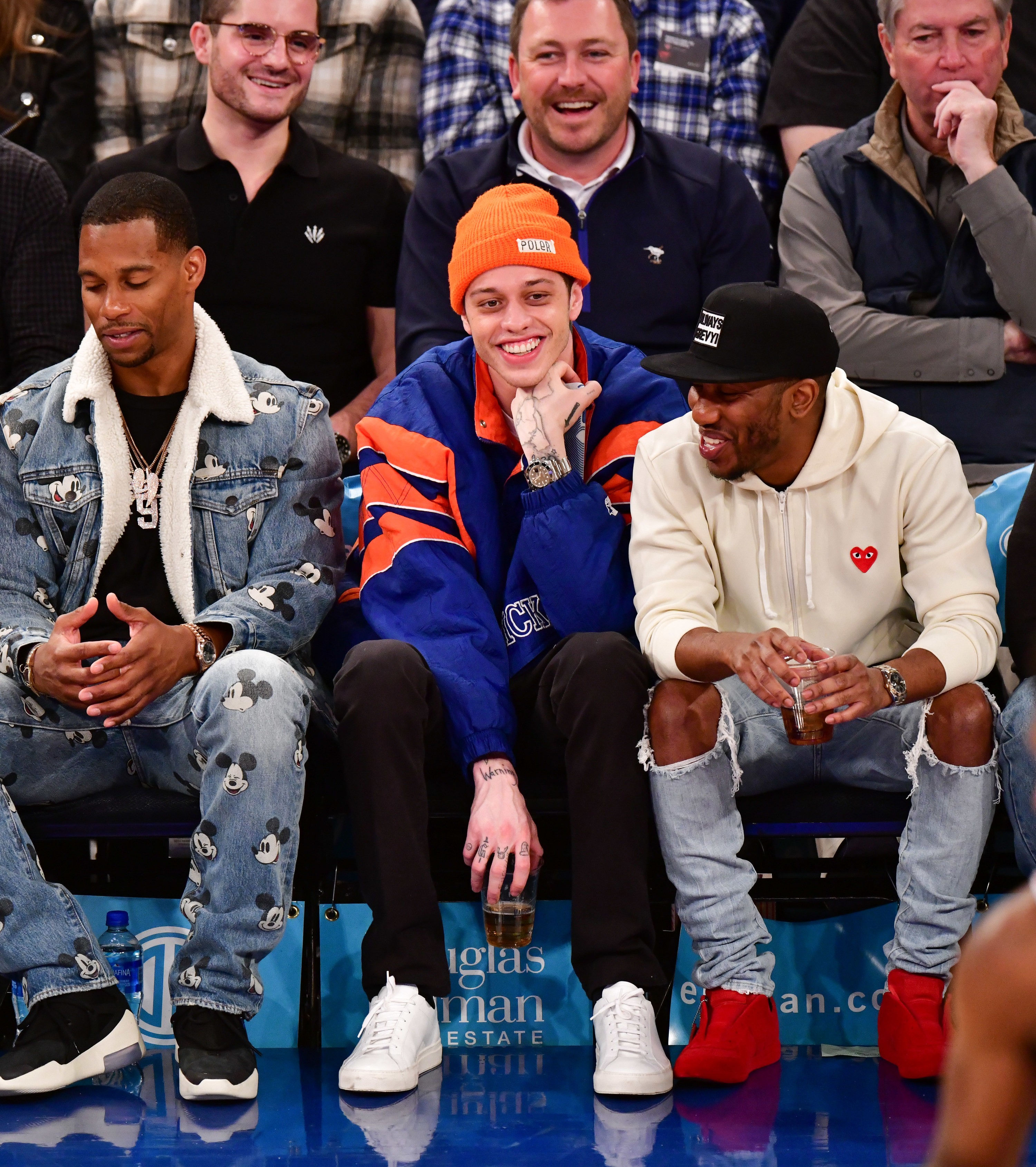 A close-up of Pete sitting courtside at a Knicks game