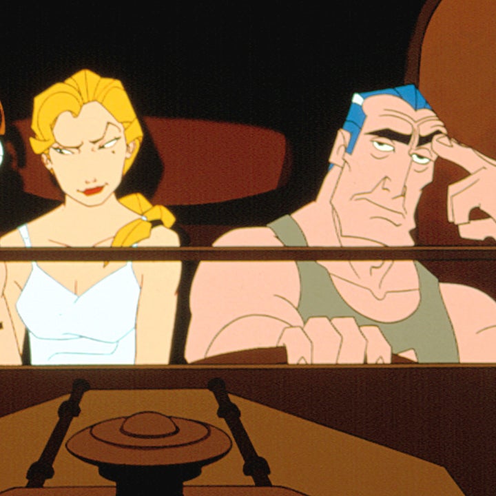 A tired man and annoyed woman drive in a car together