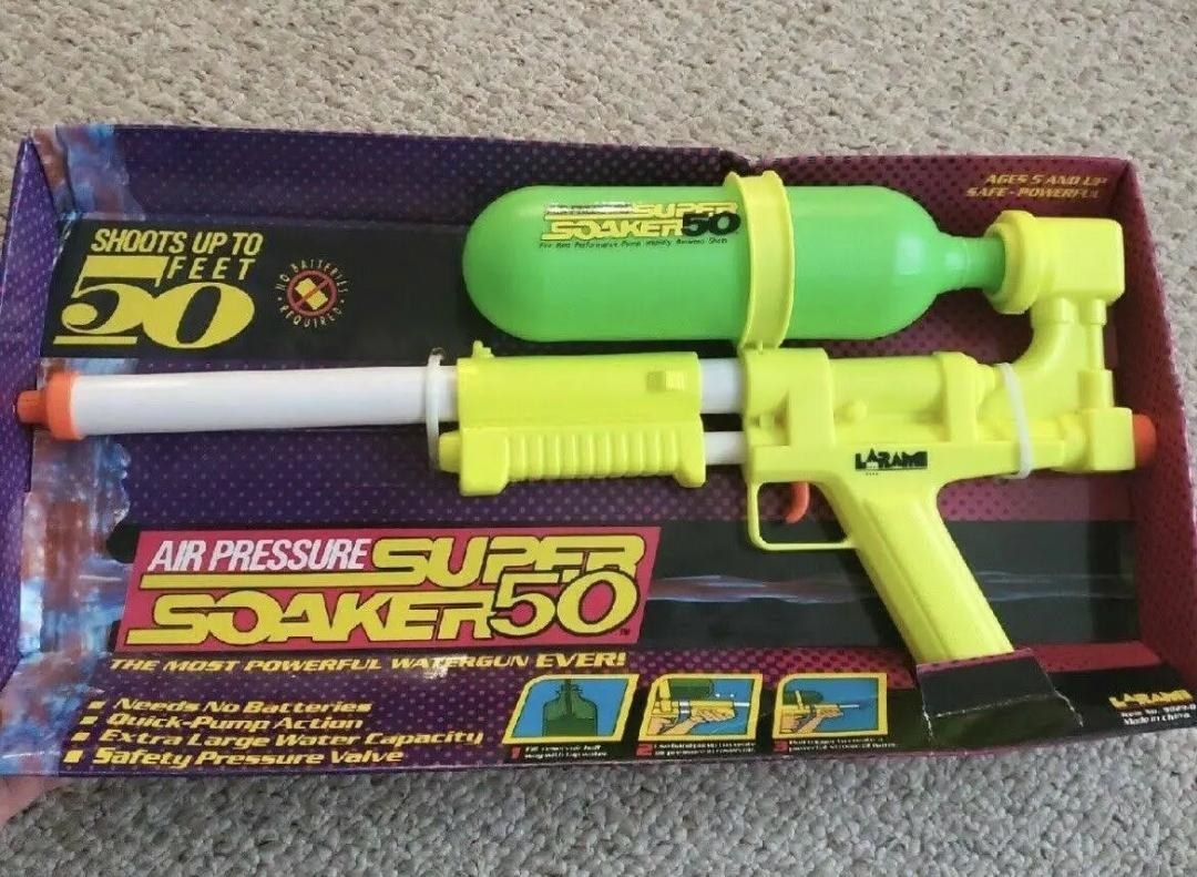 A Super Soaker 50 water gun still in its original packaging