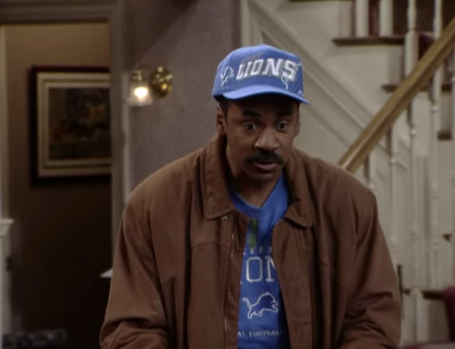 person staring at the ground