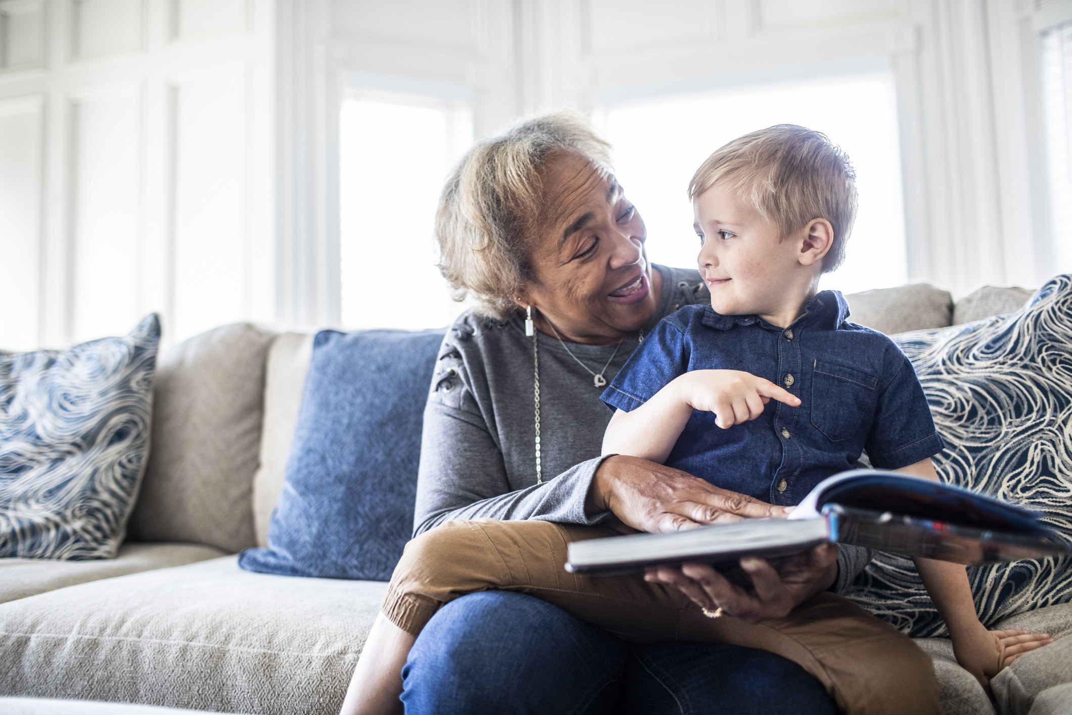 Grandma reading book to grandson