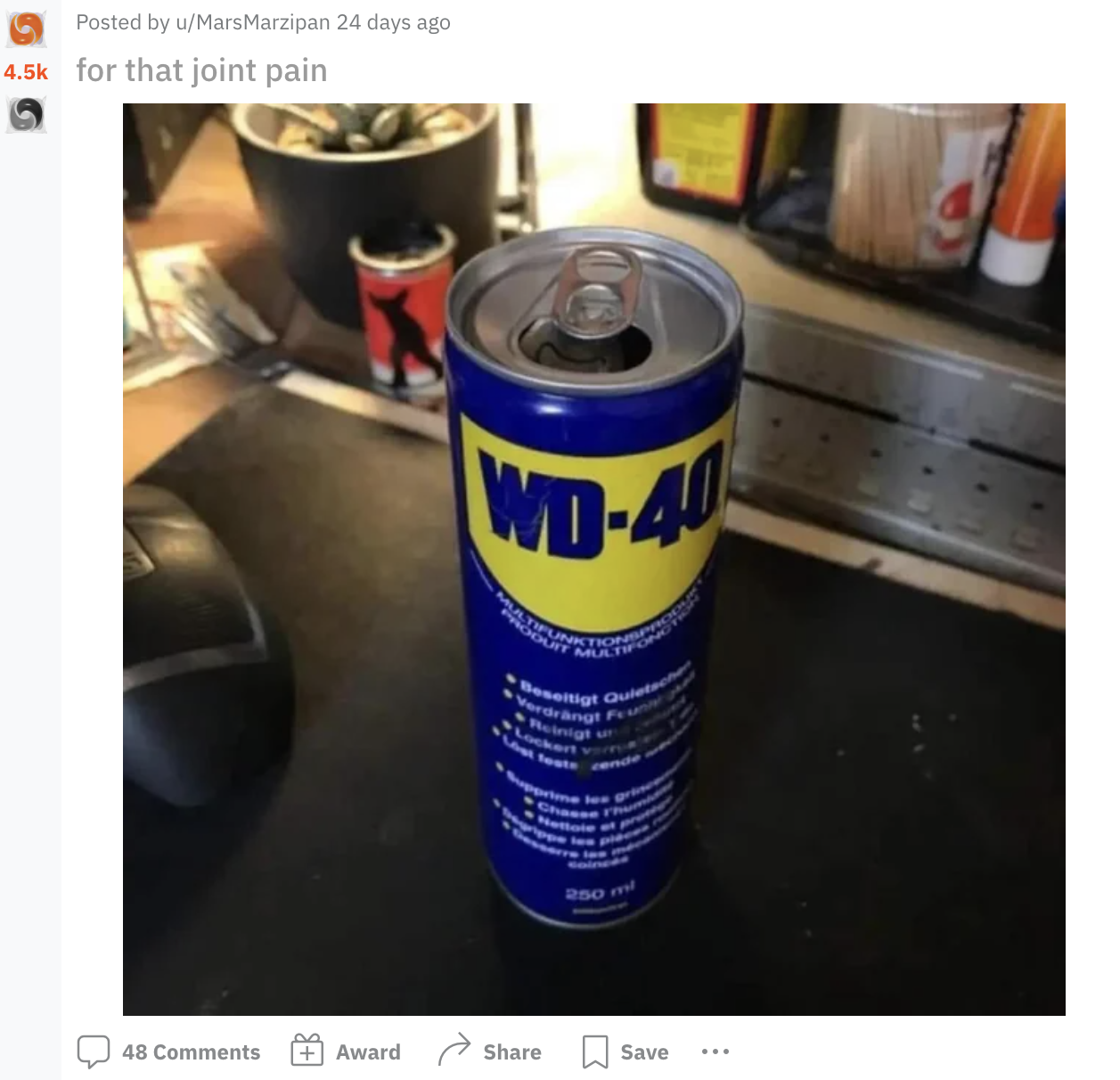 blue can with &quot;WD-40&quot; written on it