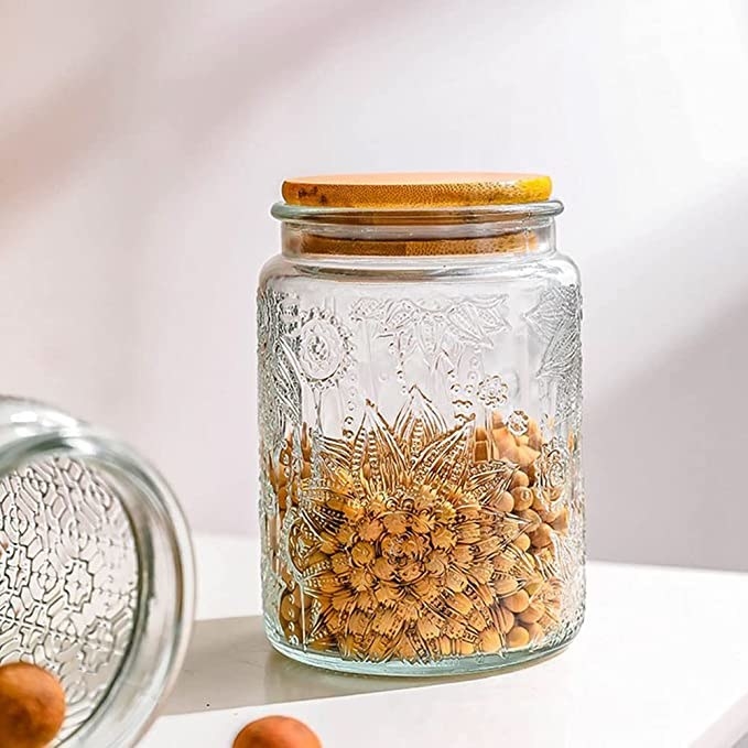 A photo of the jar with beads inside it
