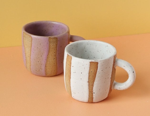 The lilac and white mugs