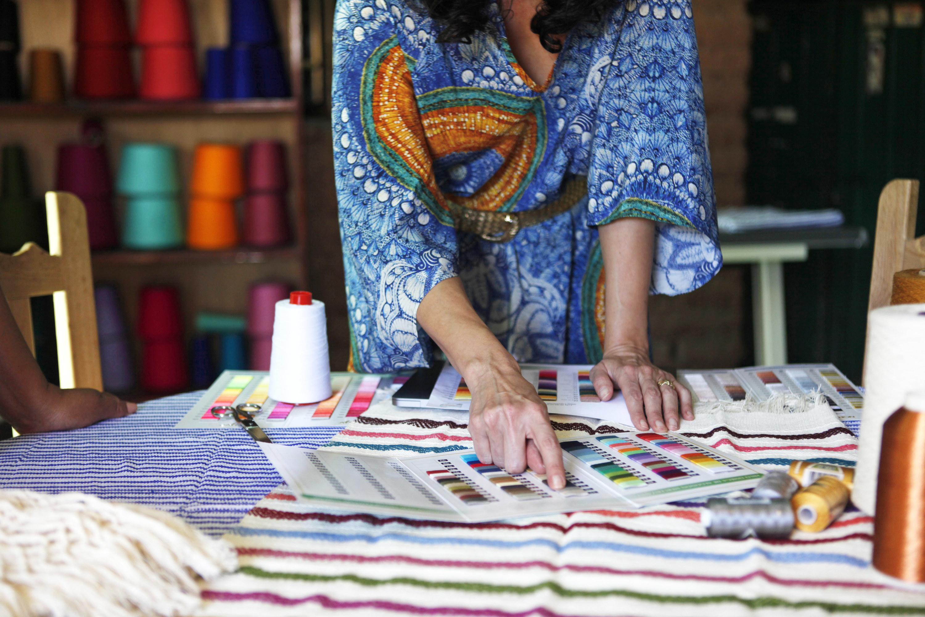 A designer picking out swatches