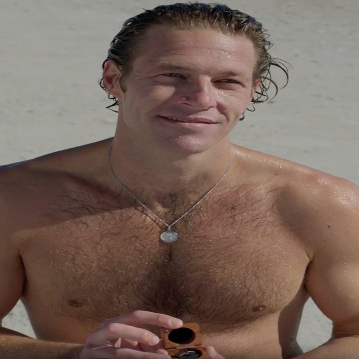 A man proposes shirtless.